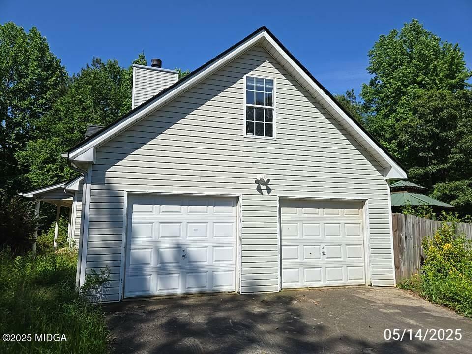 Property Photo: 5615 Highway 81 E GA 30252