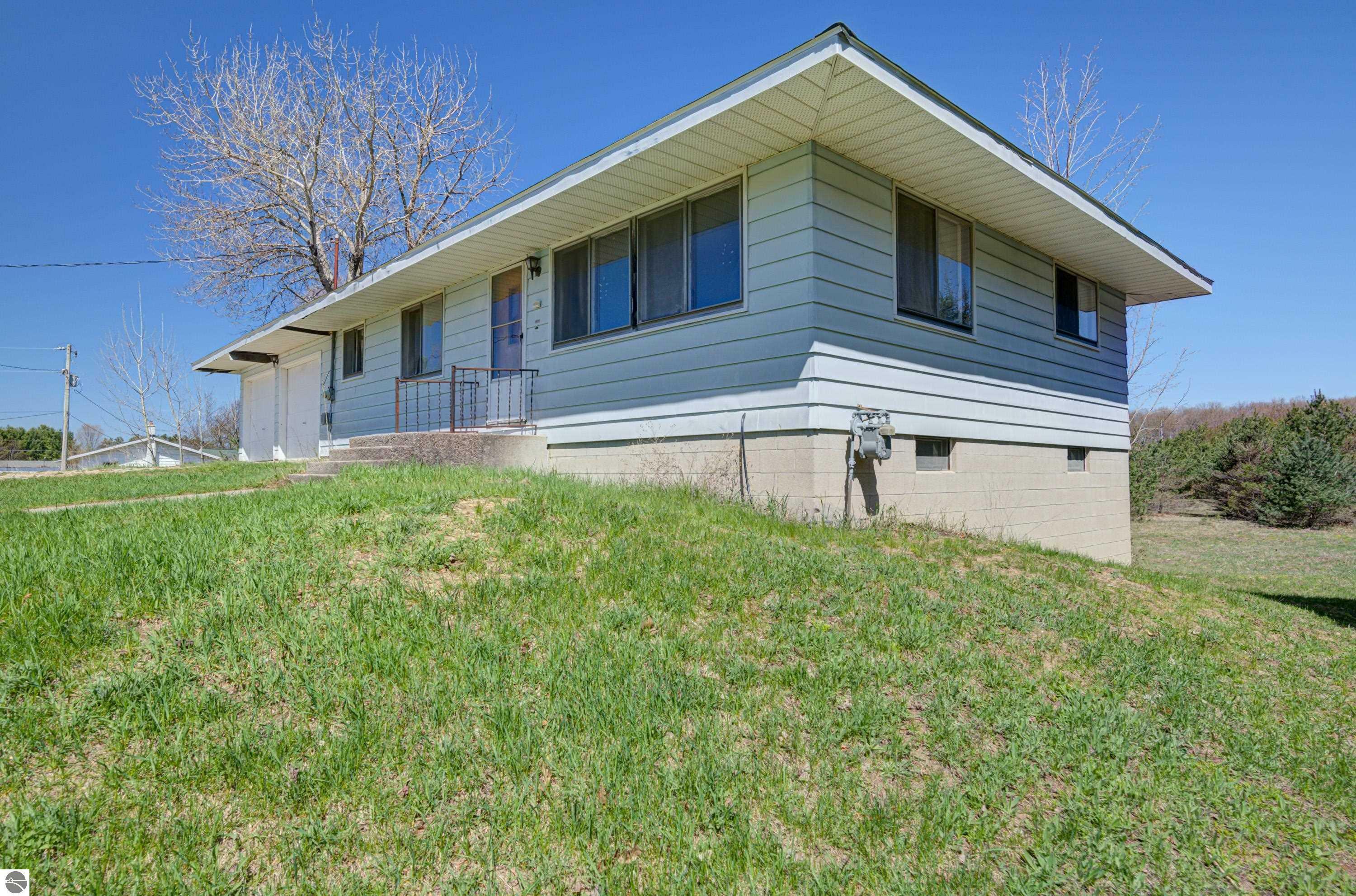 Property Photo: 5260 W Blair Townhall Road MI 49637