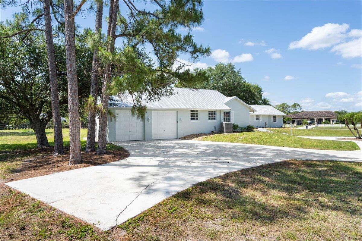 Property Photo: 10006 SW Tyler Terrace FL 34990