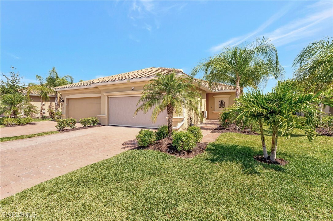Property Photo: 2065 Tamarron Lane FL 34120
