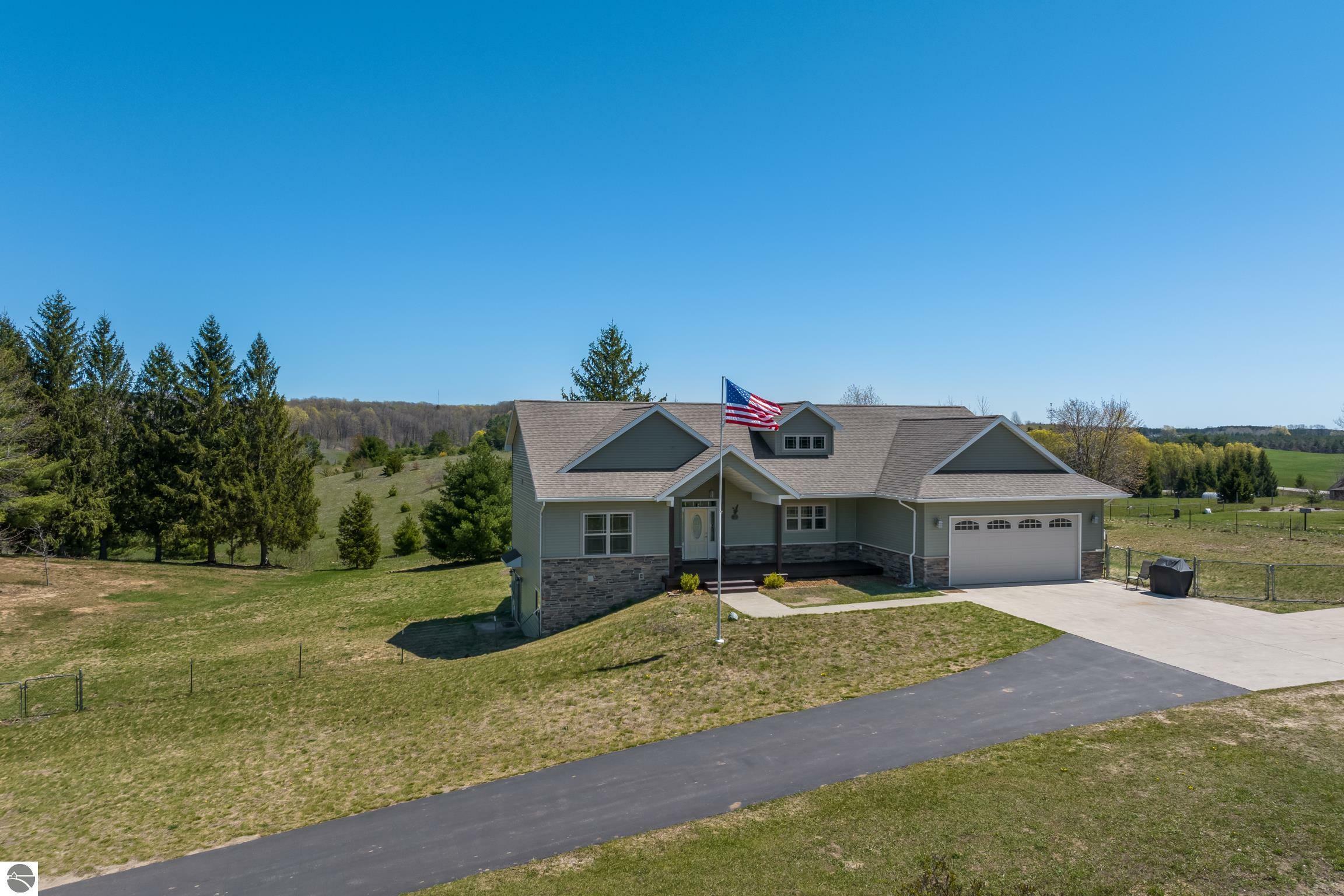 Property Photo:  8233 Barney Road  MI 49684 