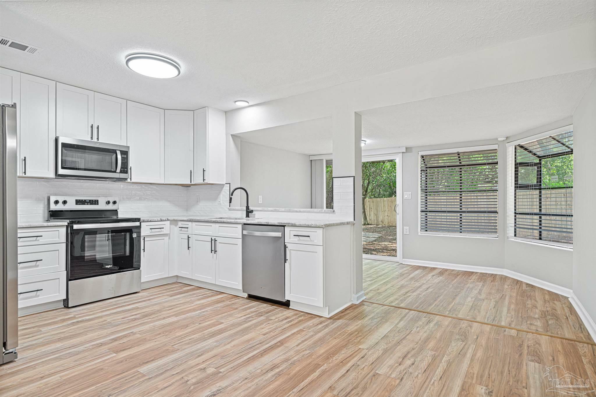 Property Photo: 7653 East Bay Blvd FL 32566
