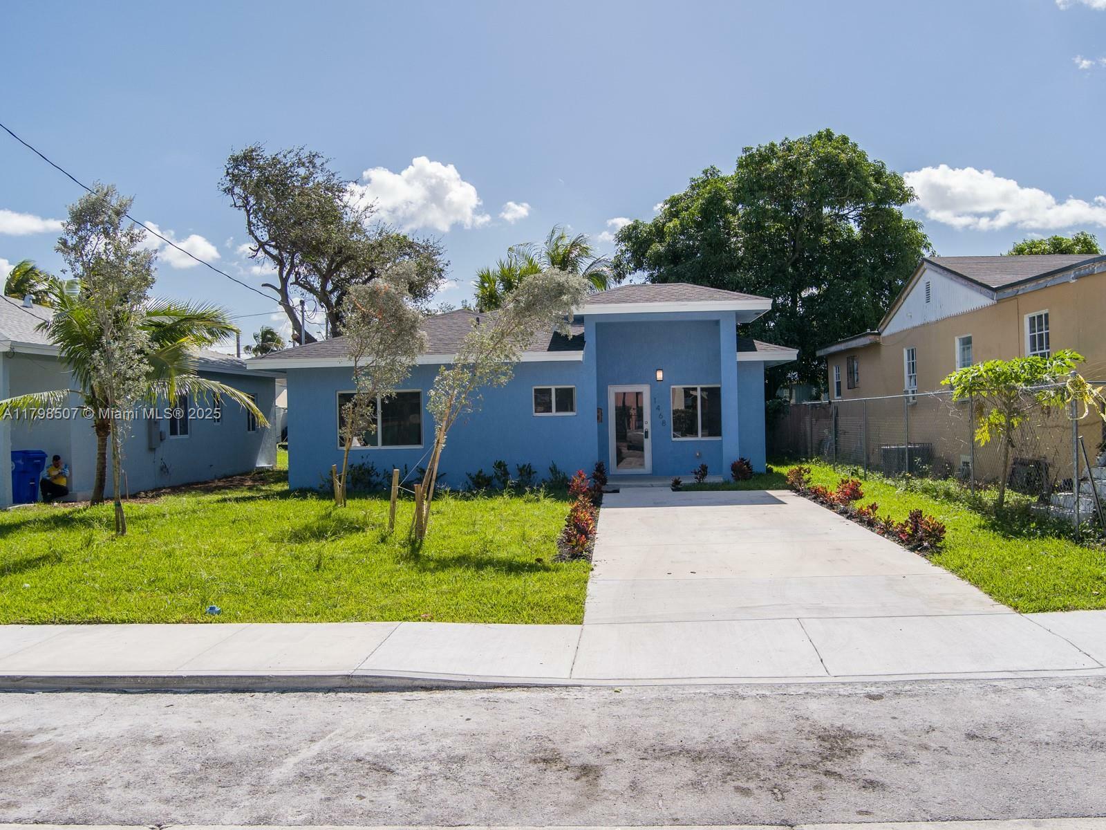 Property Photo: 1468 NW 51st St FL 33142