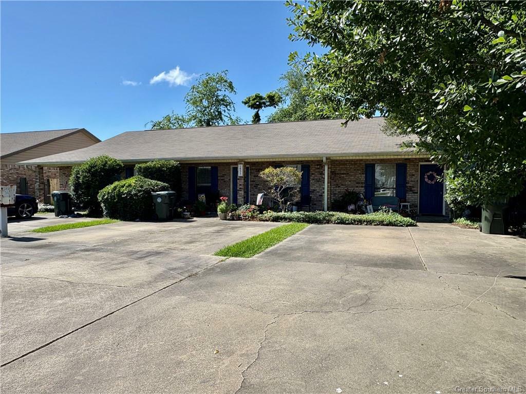 Property Photo: 1851 N Tallowood Drive LA 70605