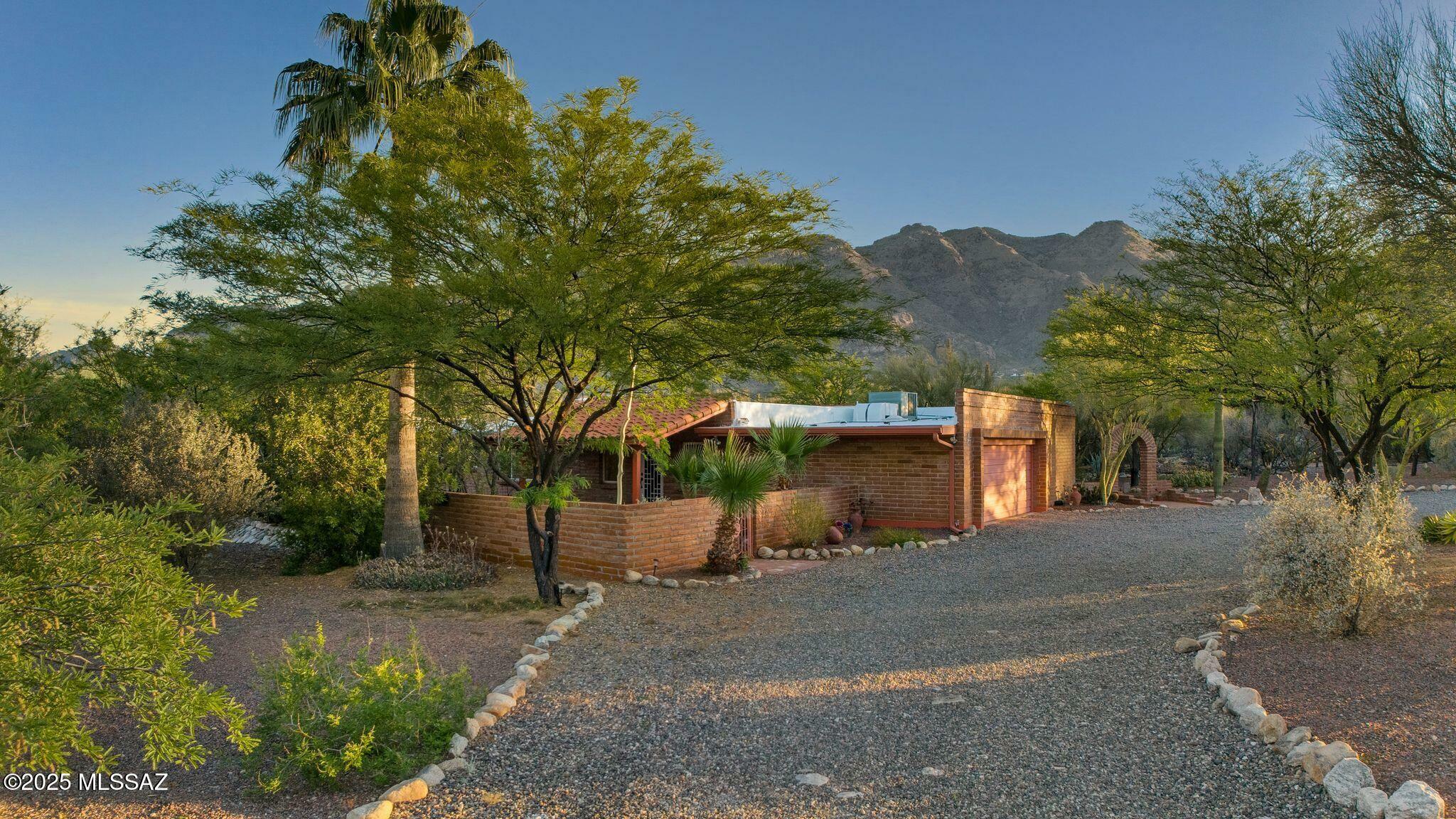 Property Photo: 4921 E Camino De Los Olivos AZ 85718