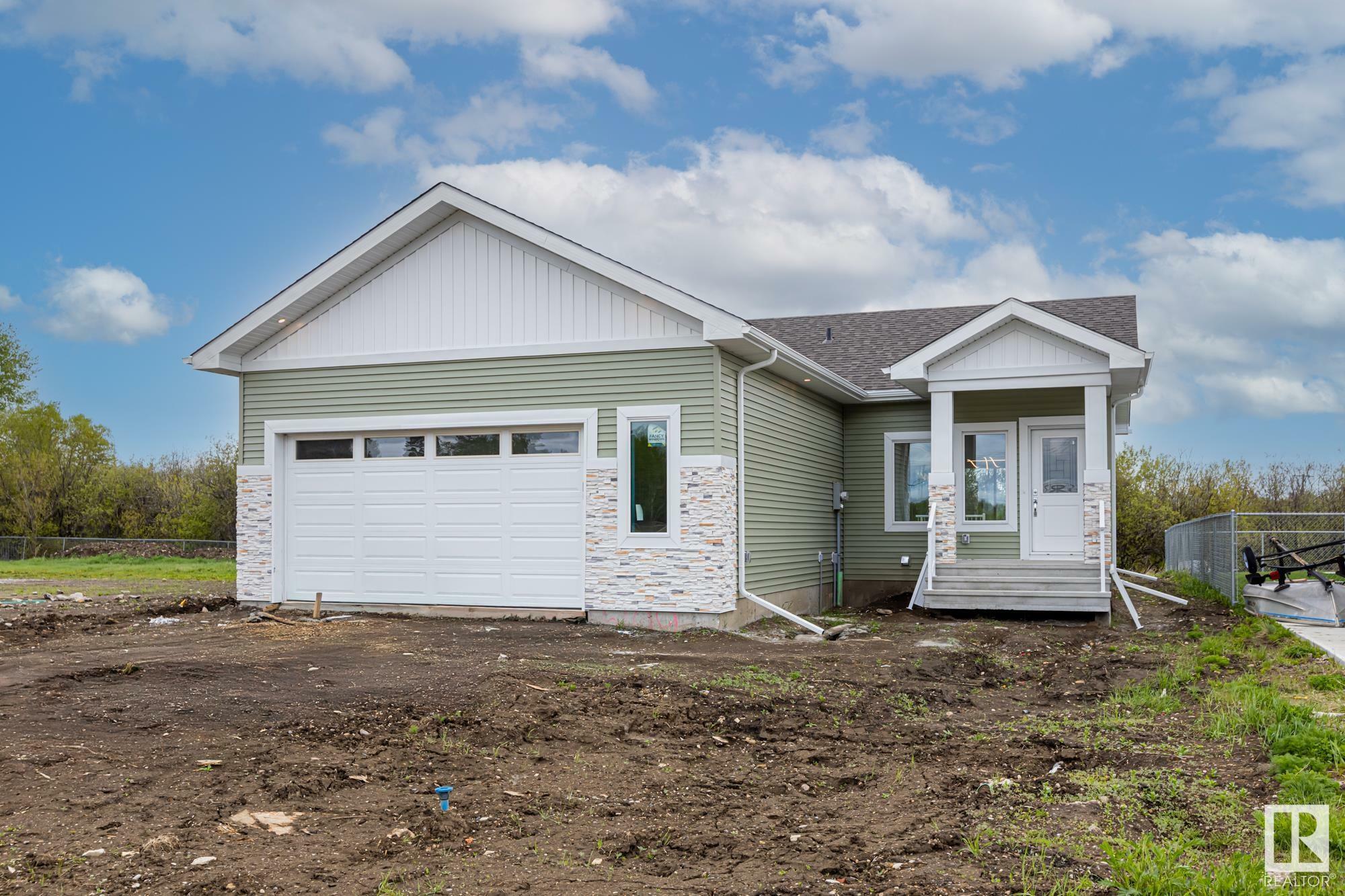 Property Photo:  5109 55 Street  AB T0E 2K0 
