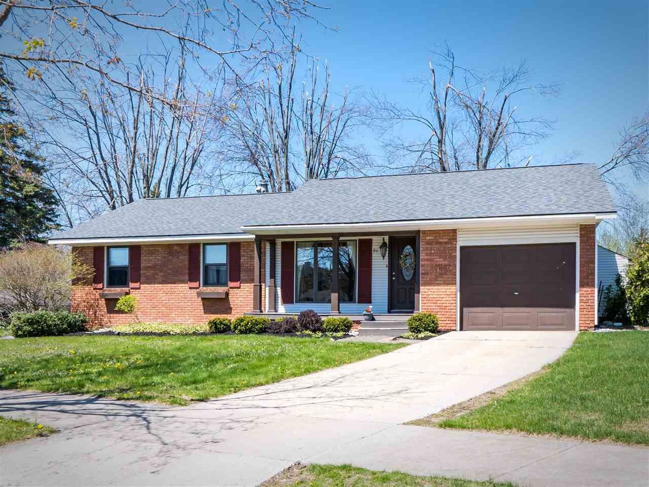 Property Photo:  911 Regent Court  MI 49770 