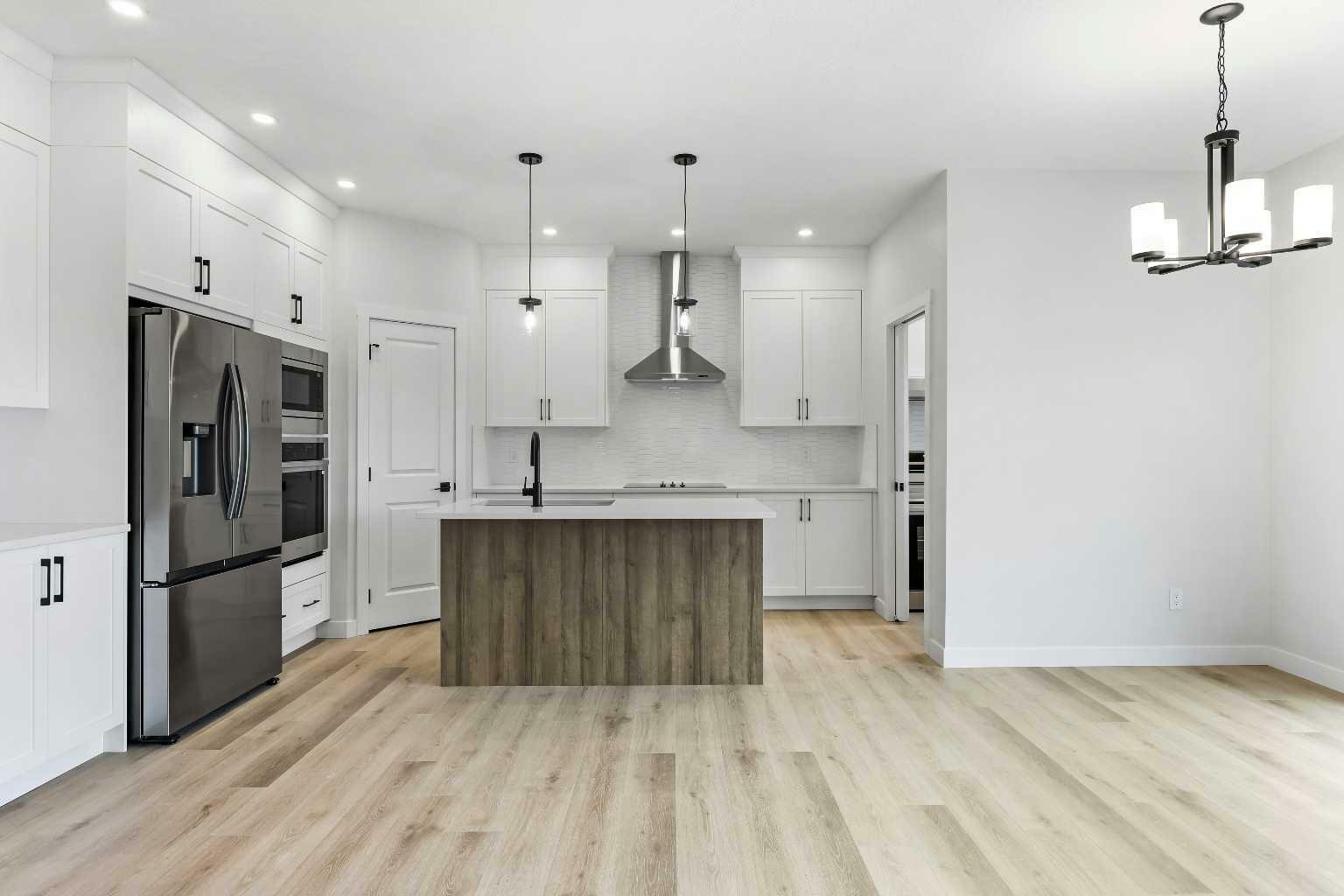 Property Photo: 3672 Bayside Boulevard SW AB T4B 5R6
