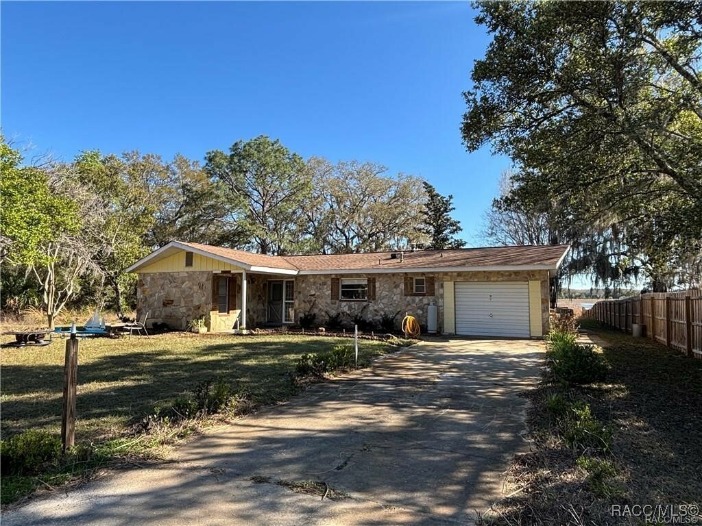 Property Photo: 24892 SW Sailboat Drive FL 34431