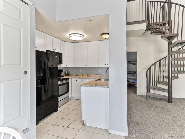Property Photo: 8361 S Upham Way 209 CO 80128