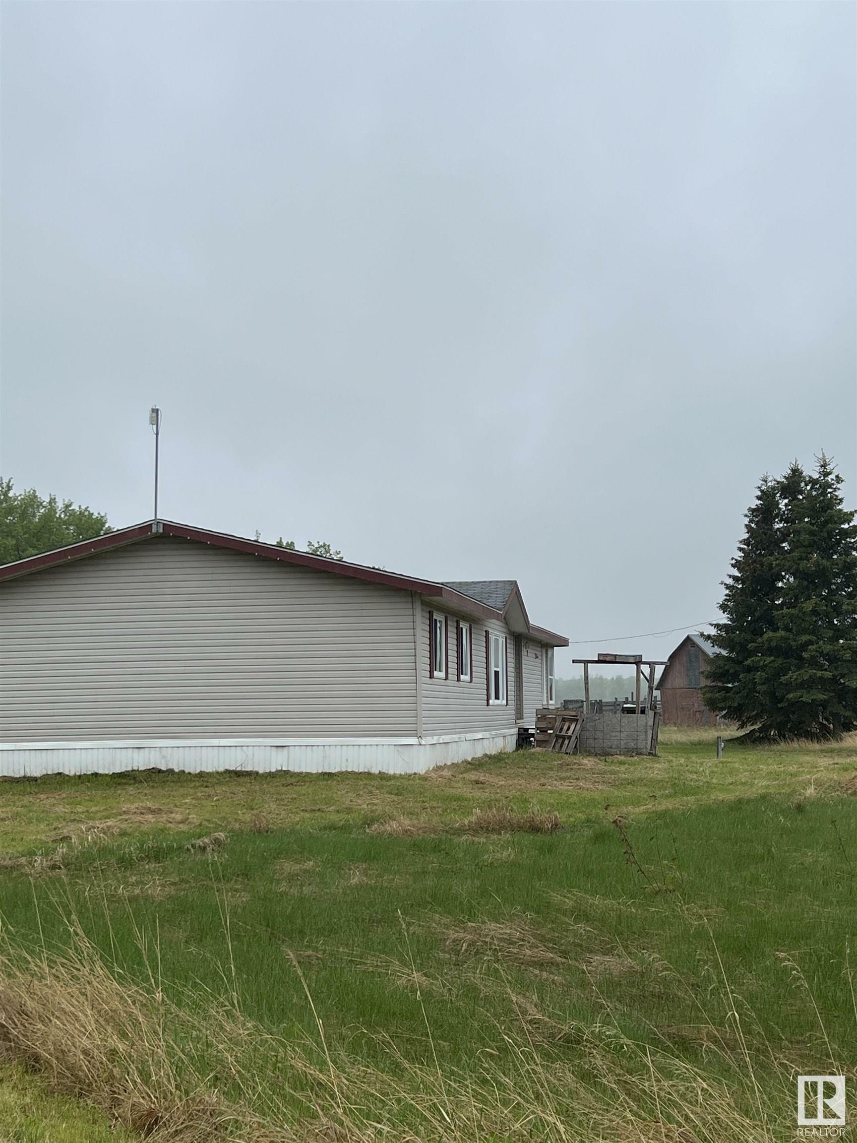 Property Photo:  14323 Township 592  AB T0A 3L0 