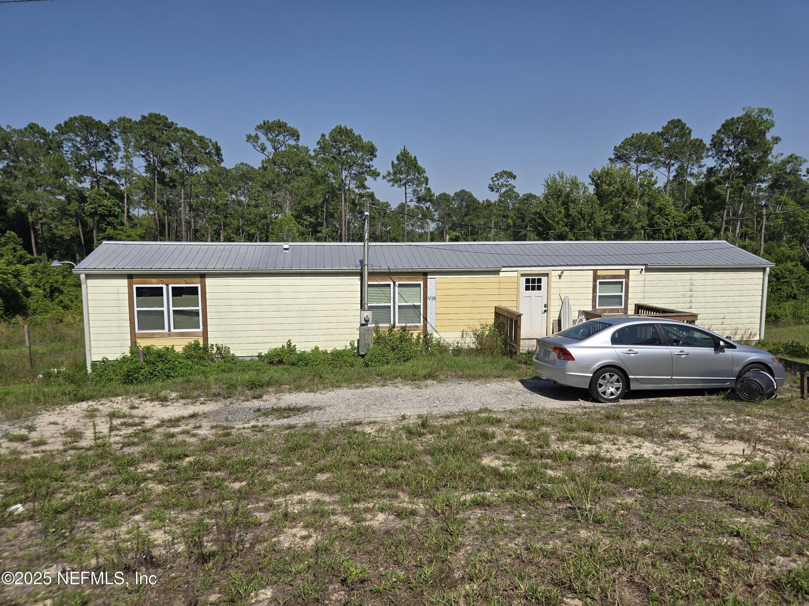 Property Photo:  130 Magnolia Street  FL 32181 