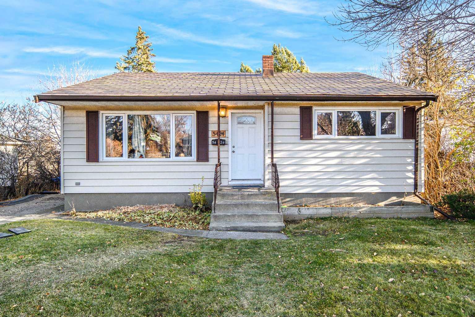 Property Photo: 5424 Thorncliffe Drive NW AB T2K 2Z5