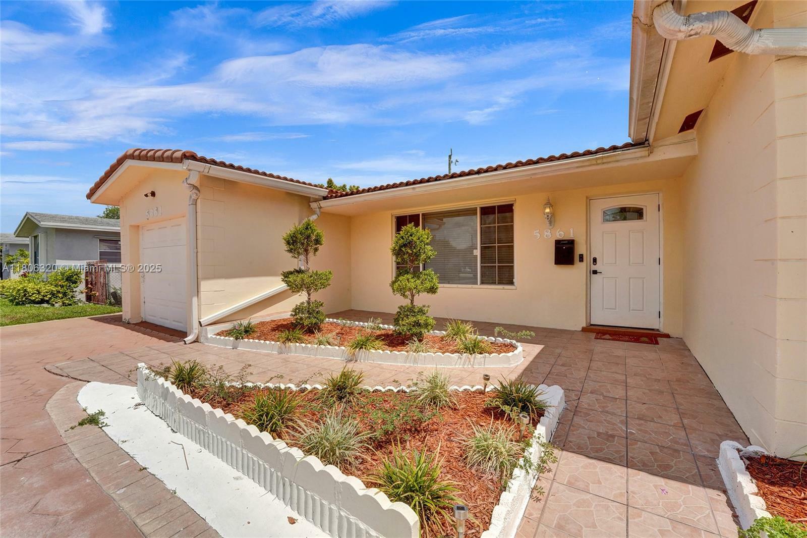 Property Photo: 5861 NW 18th Ct FL 33313