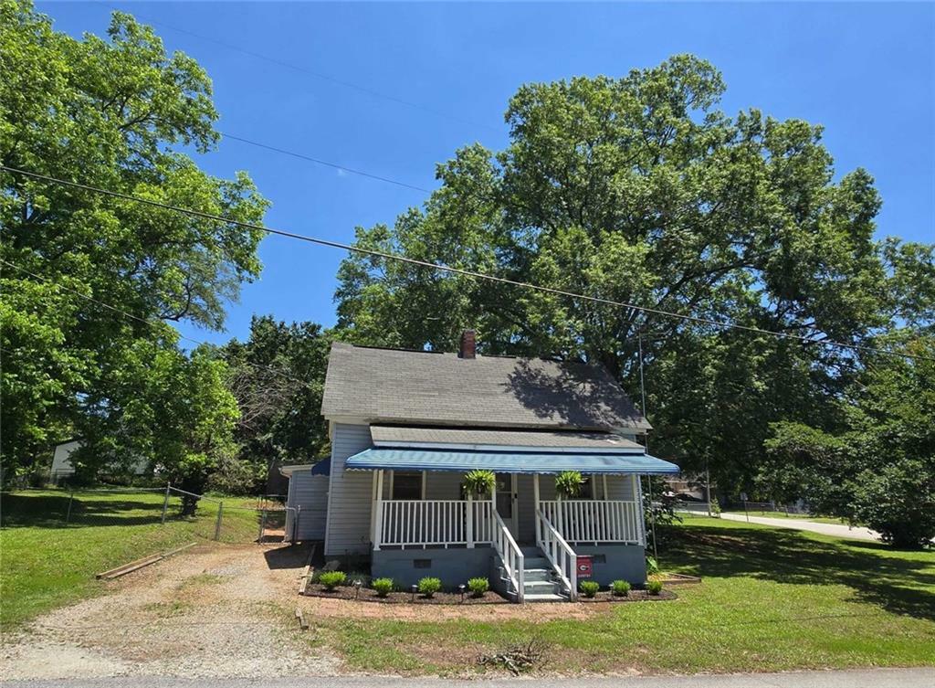 Property Photo:  5108 Hackett Street NE  GA 30014 