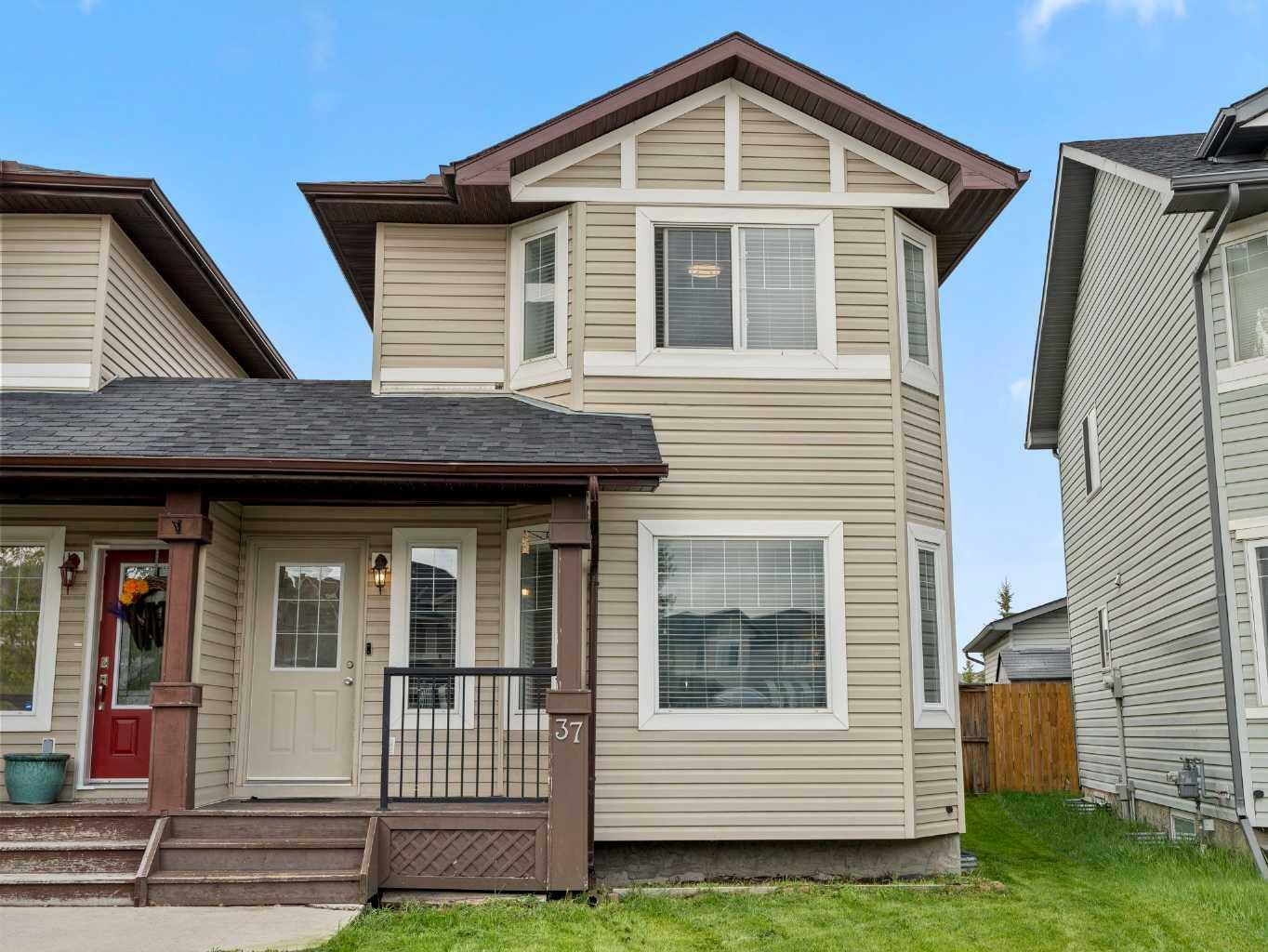Property Photo: 37 Sunrise Loop SE AB T1V 2B2