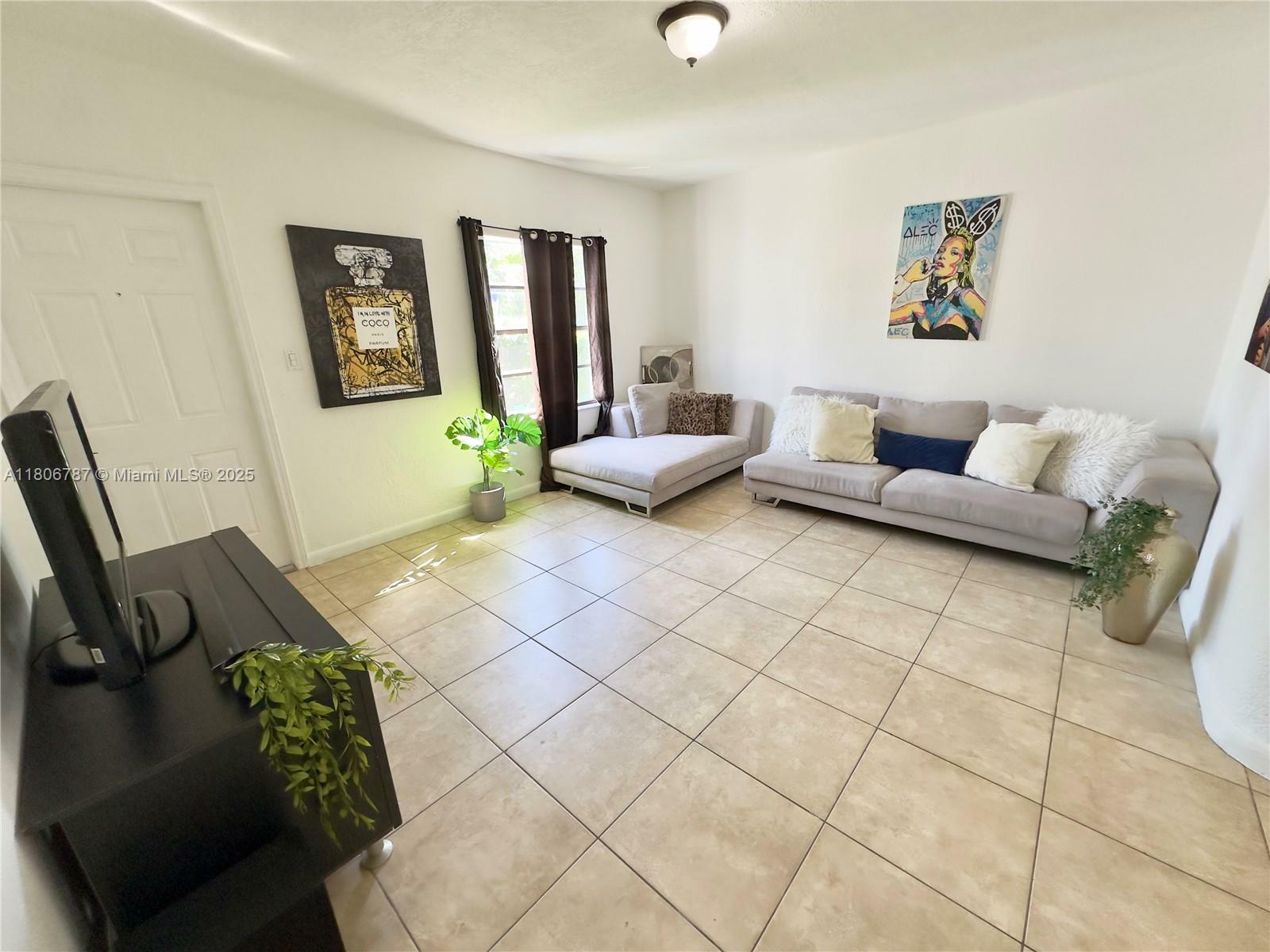 Property Photo: 301 NW 37th St FL 33127