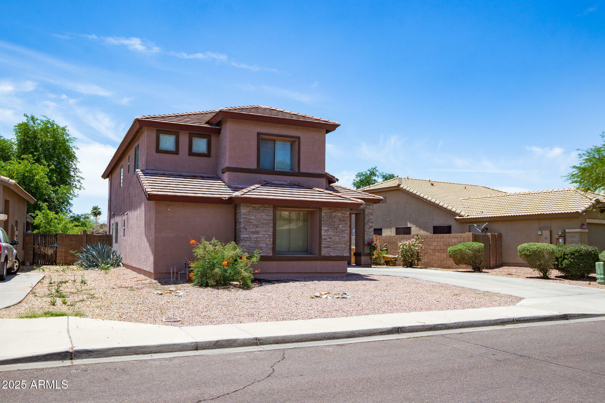 Property Photo: 13709 W Rovey Avenue AZ 85340