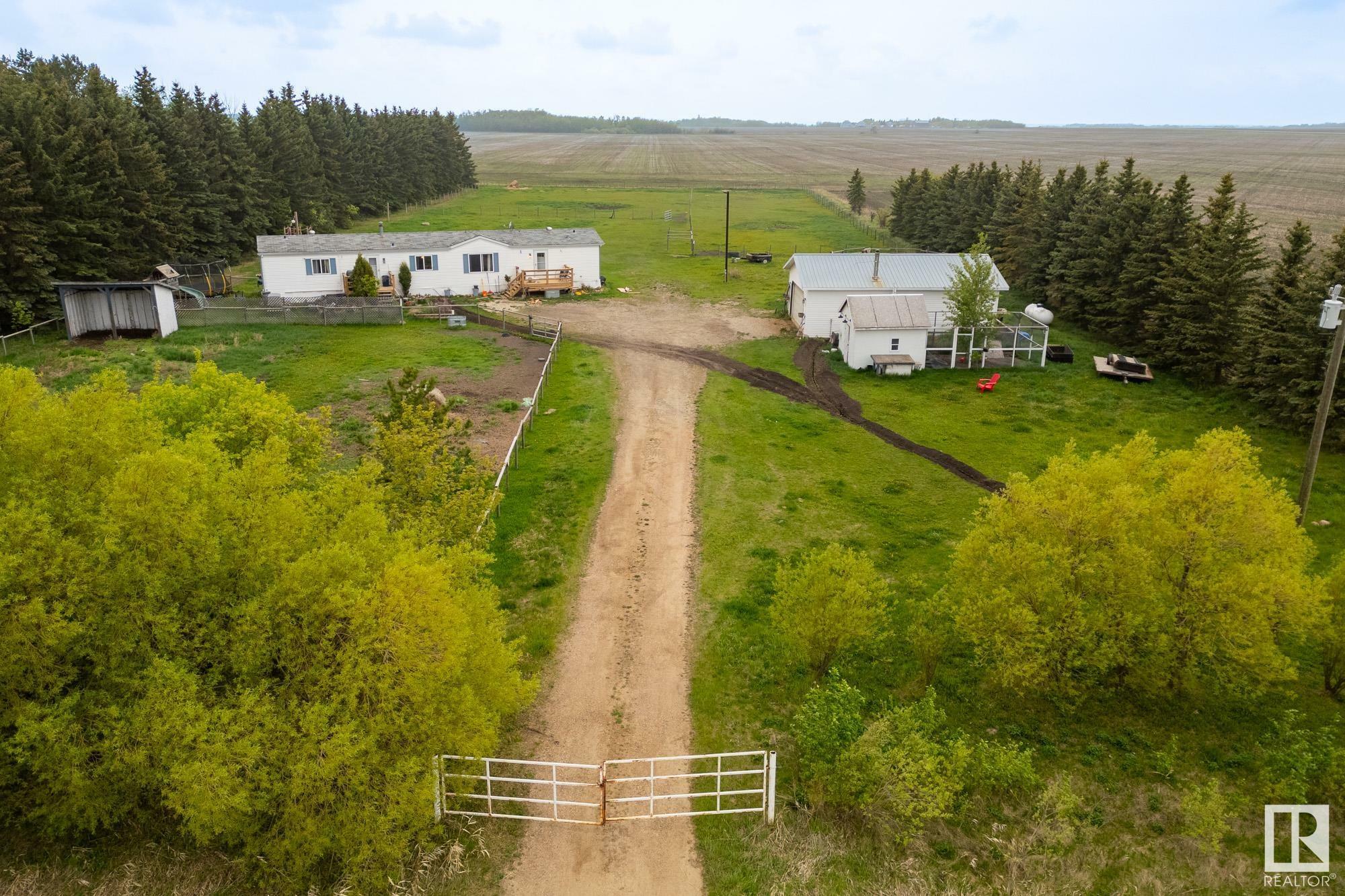 Property Photo: 55524 Rge Road 261 AB T8R 1P4