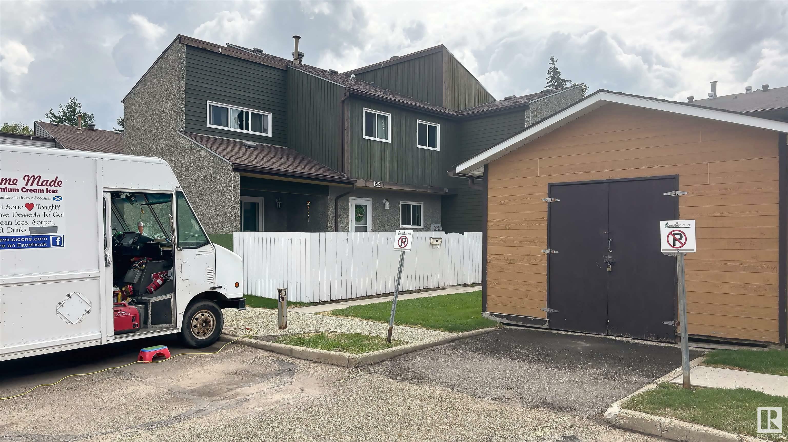 Property Photo: 122 Kaskitayo Court NW 122 AB T6J 3T3