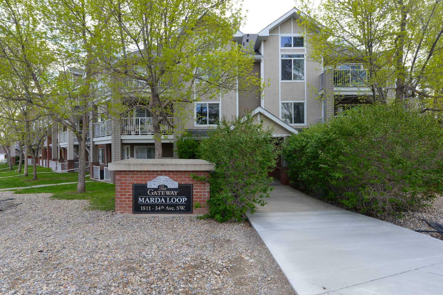 Property Photo: 1811 34 Avenue SW 302 AB T2T 2B9