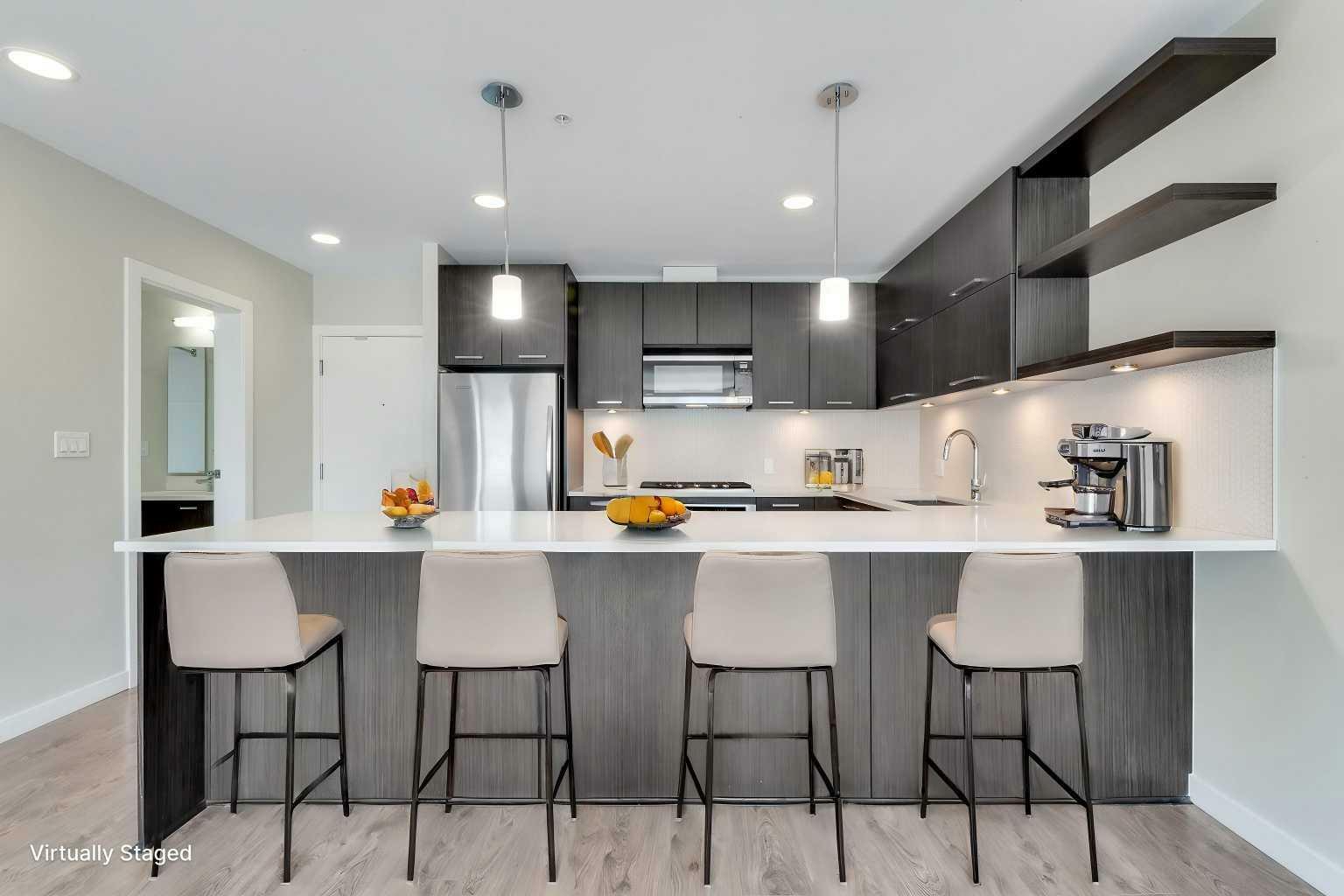 Property Photo: 707 4 Street NE 214 AB T2E 3S7