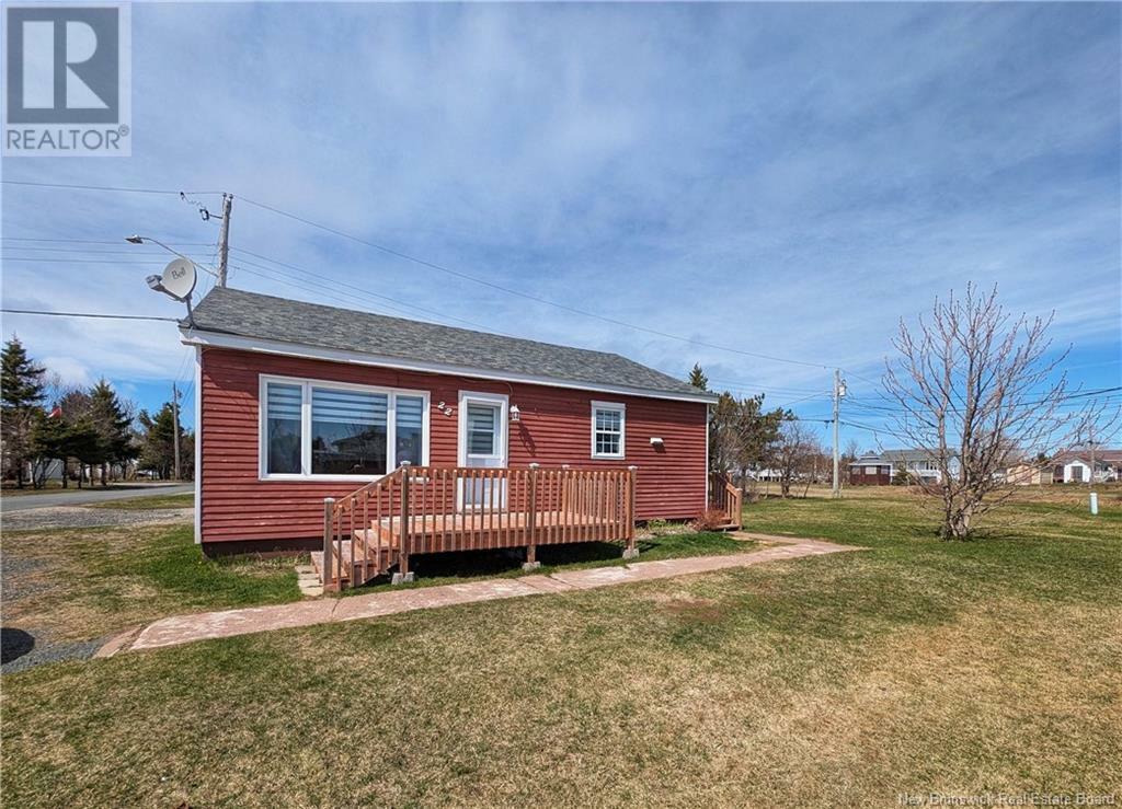 Property Photo: 22 De La Source Street NB E8S 1Z3