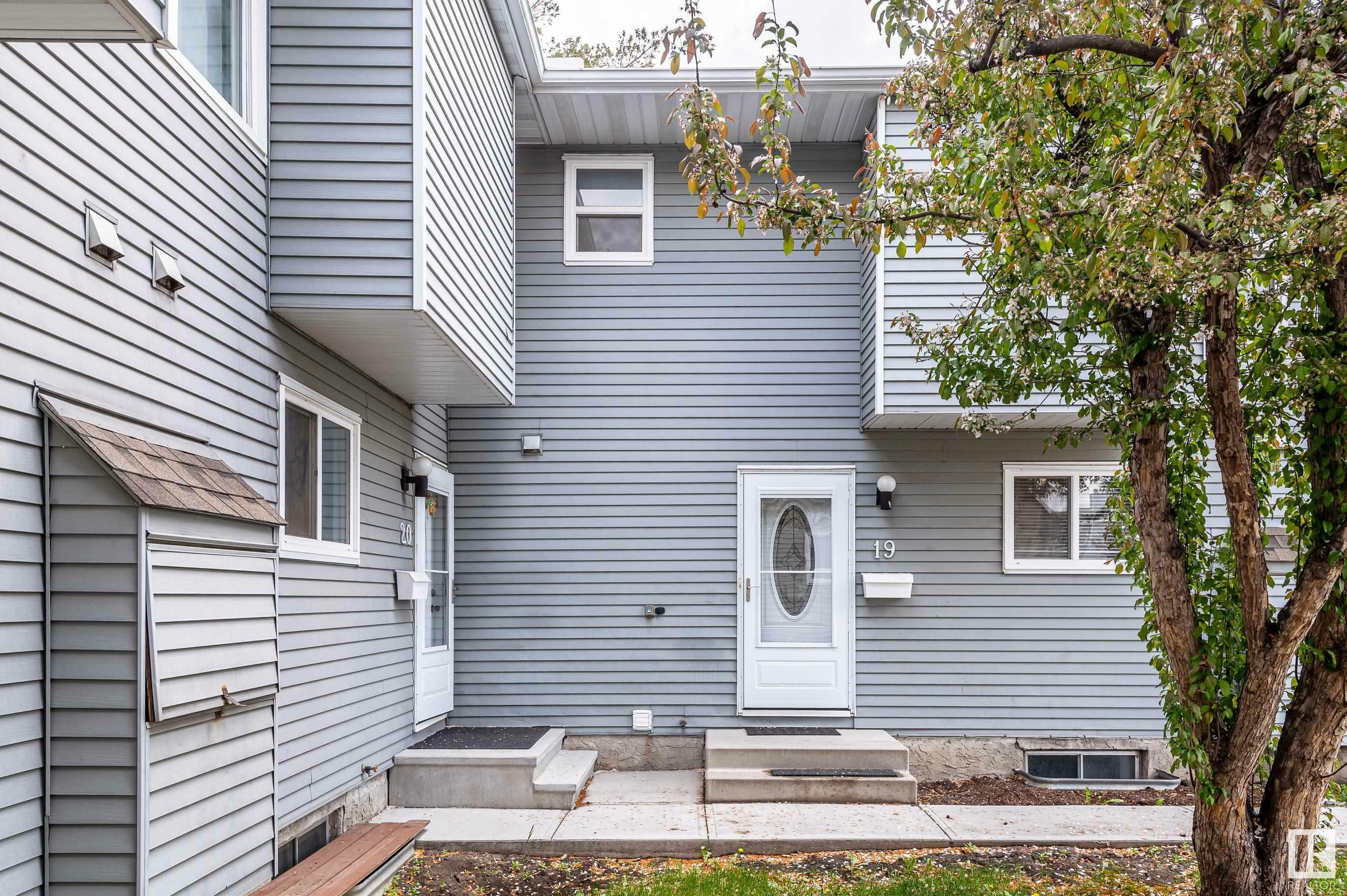 Property Photo: 4403 Riverbend Road NW 19 AB T6H 5S9