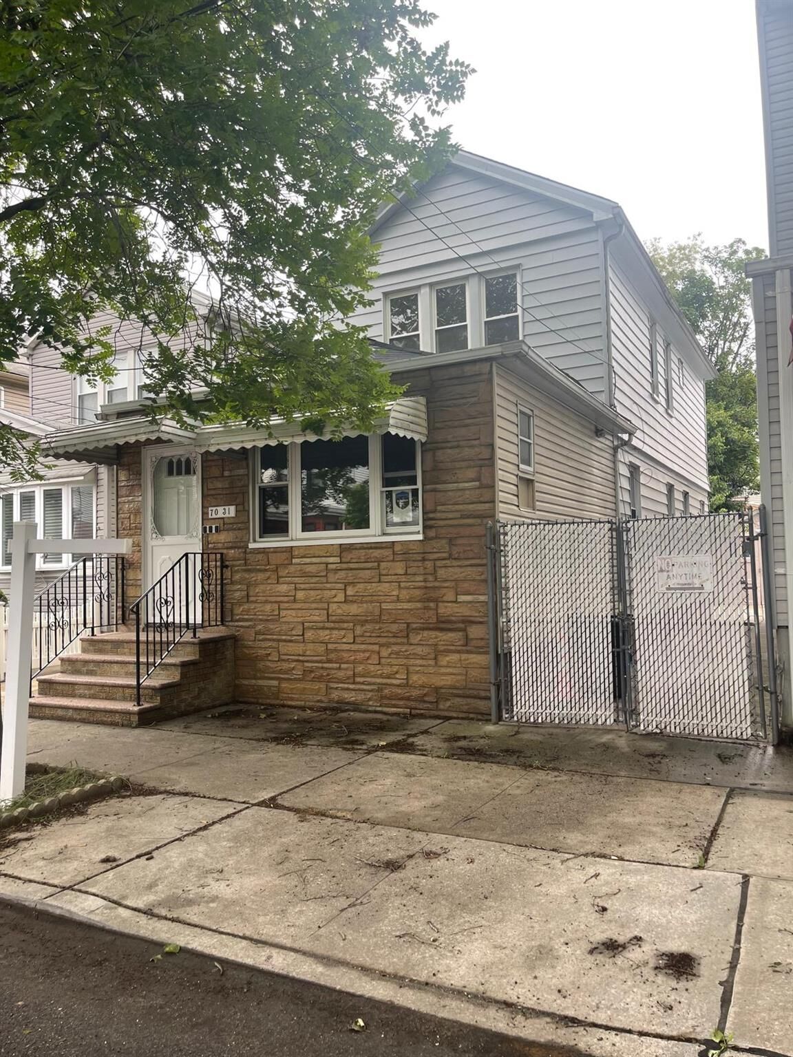 Property Photo:  70-31 71 Place  NY 11385 