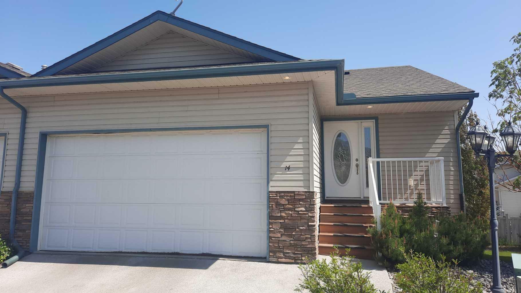 Property Photo: 14 Garden Way AB T0J 0Y5