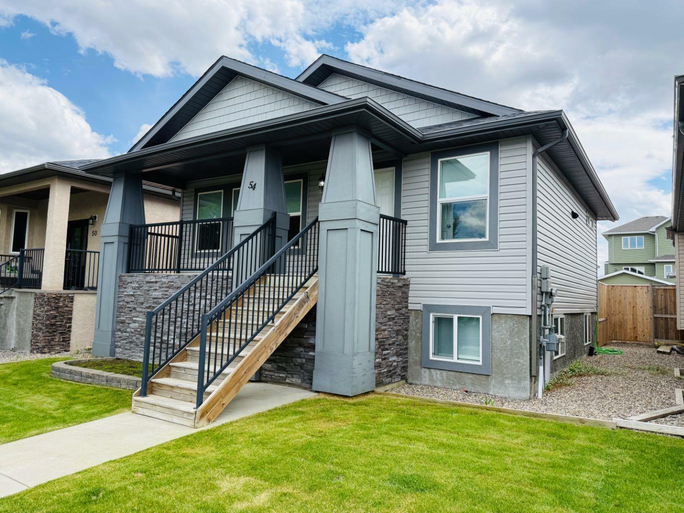Property Photo: 54 Sunridge Boulevard W AB T1J 0T4