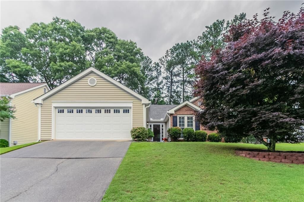 Property Photo:  1115 Hunters Creek Court  GA 30043 