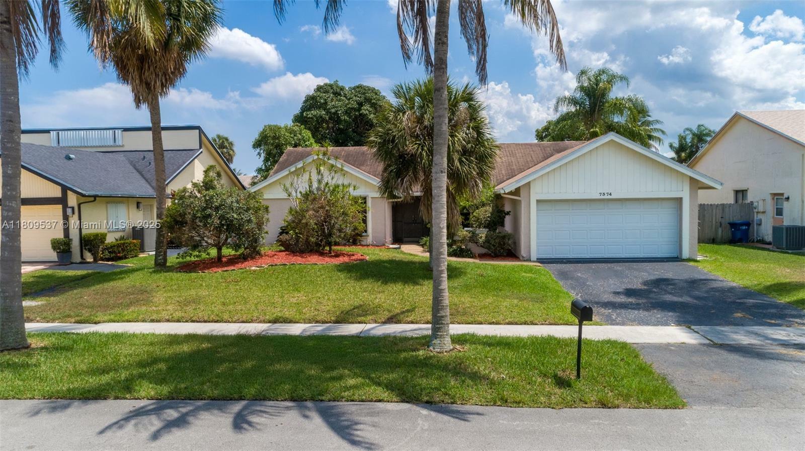 Property Photo:  7374 NW 48th St  FL 33319 