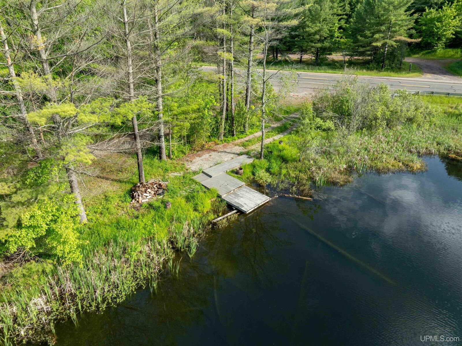 Property Photo:  Tbd Ackerman Lake Road  MI 49806 