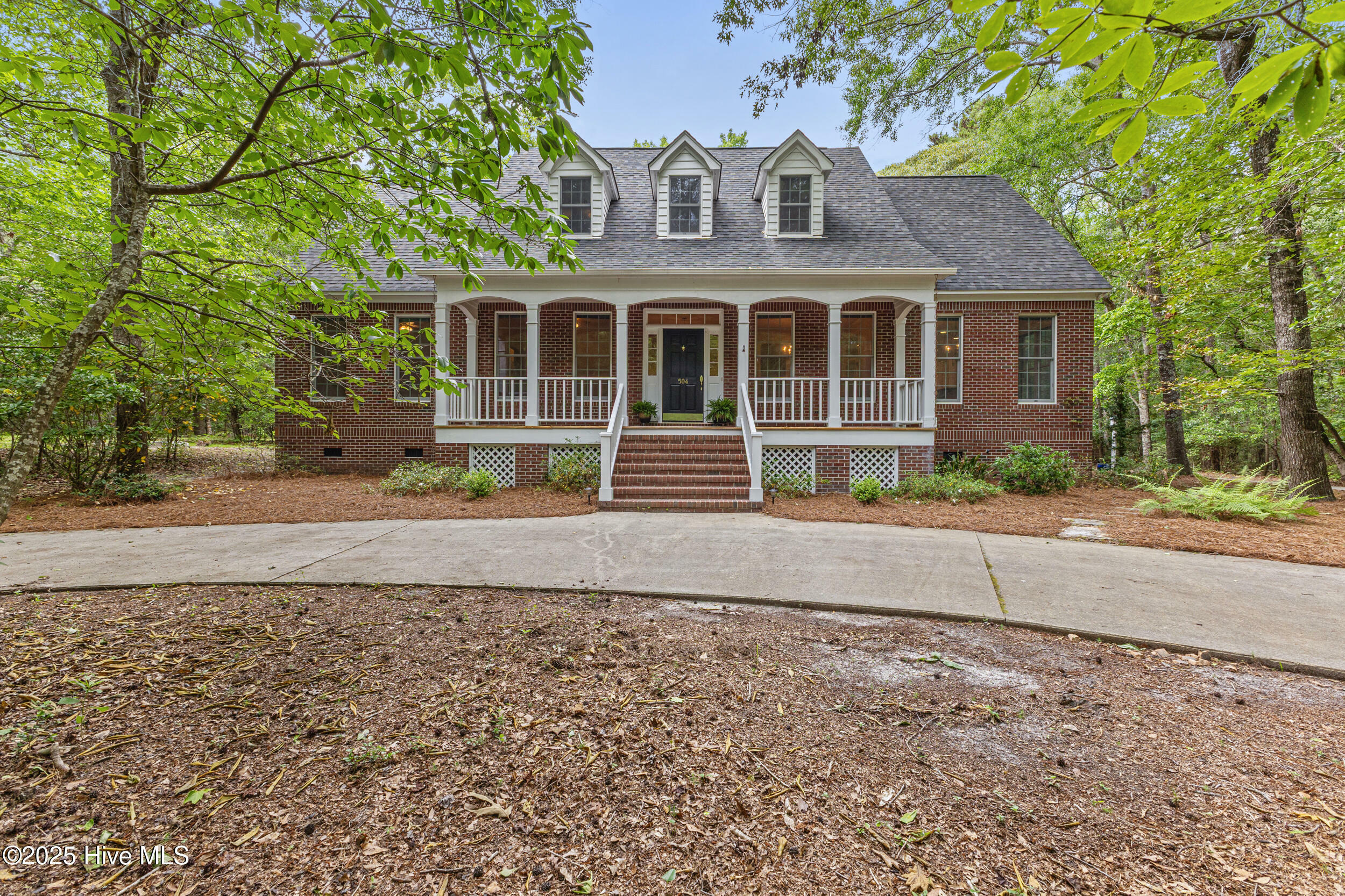 Property Photo:  504 Captain Dexter Wynd  NC 28411 