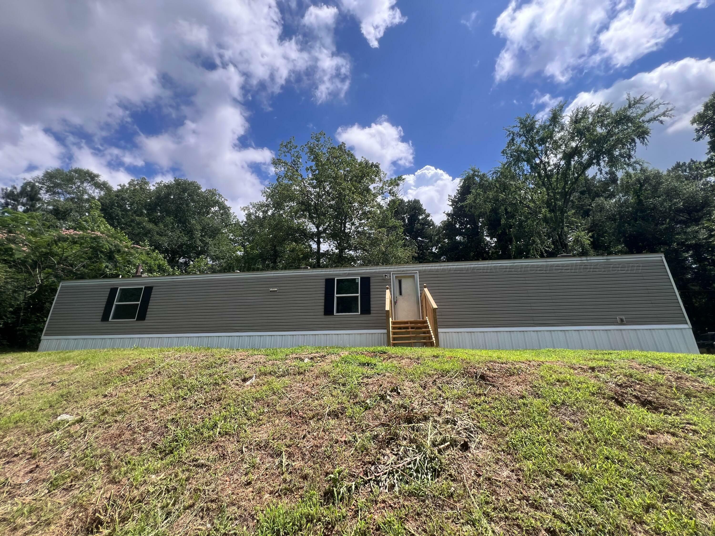 Property Photo: 8614 Honeysuckle Ln AL 35180