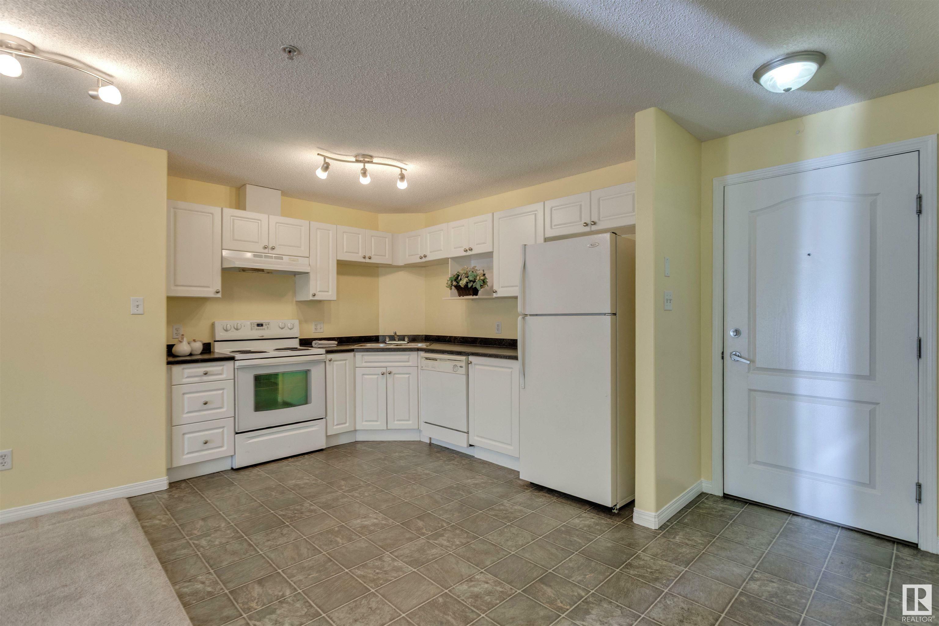 Property Photo: 320 Clareview Station Drive NW 2116 AB T5Y 0E5