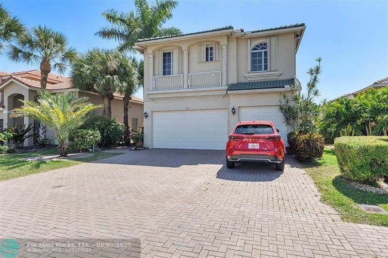 Property Photo: 132 Catania Way FL 33411