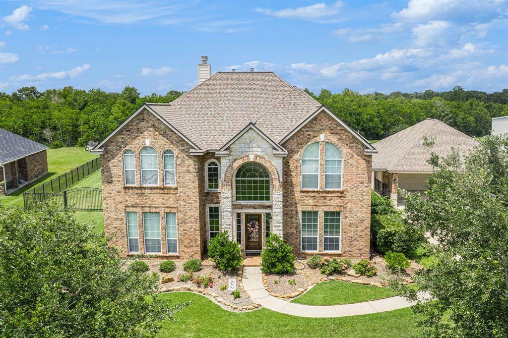 Property Photo: 9011 Tumblewood Drive TX 77523