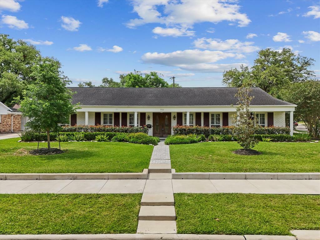 Property Photo: 7723 Meadowbriar Lane TX 77063