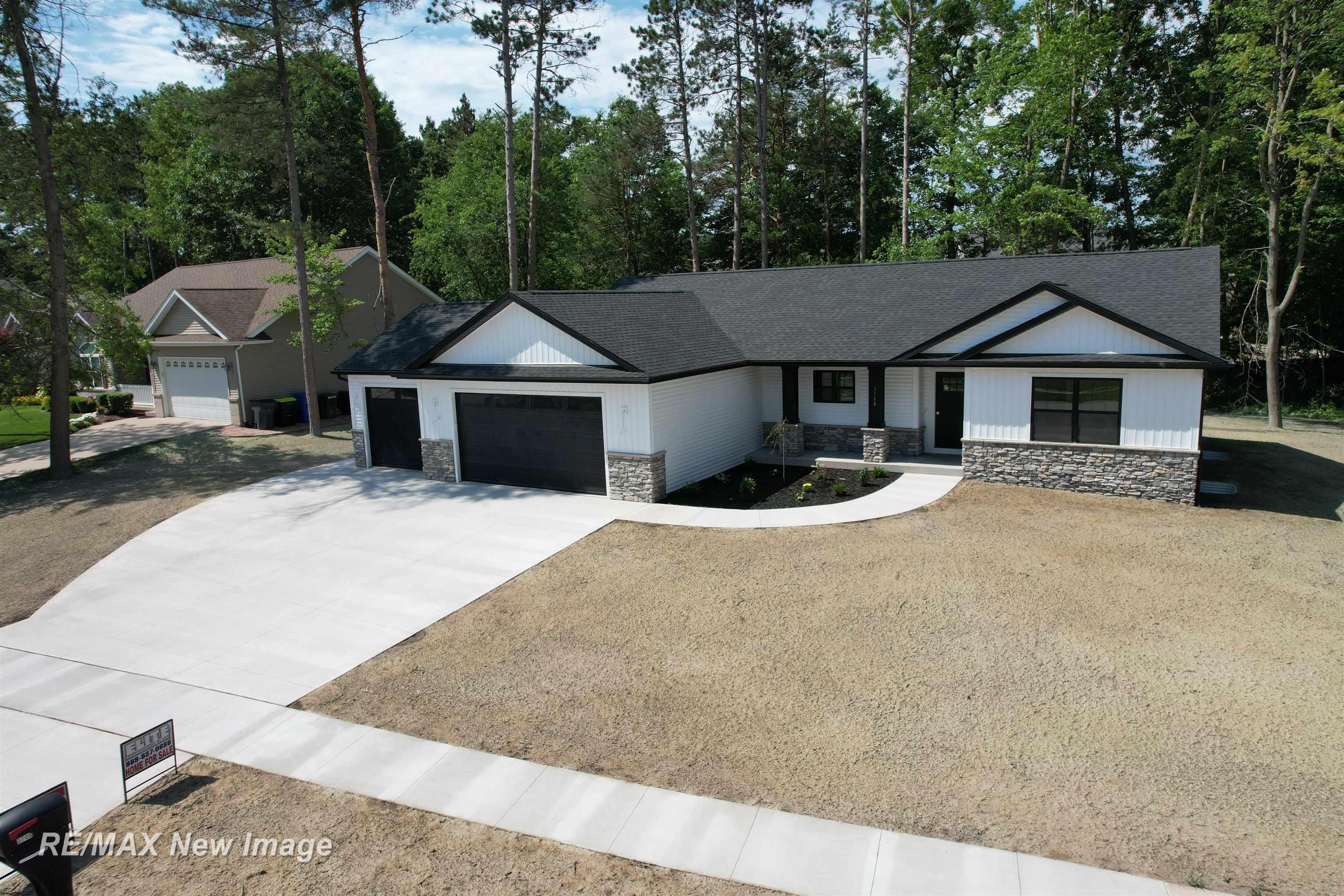 Property Photo:  3706 Bobcat Court  MI 48642 