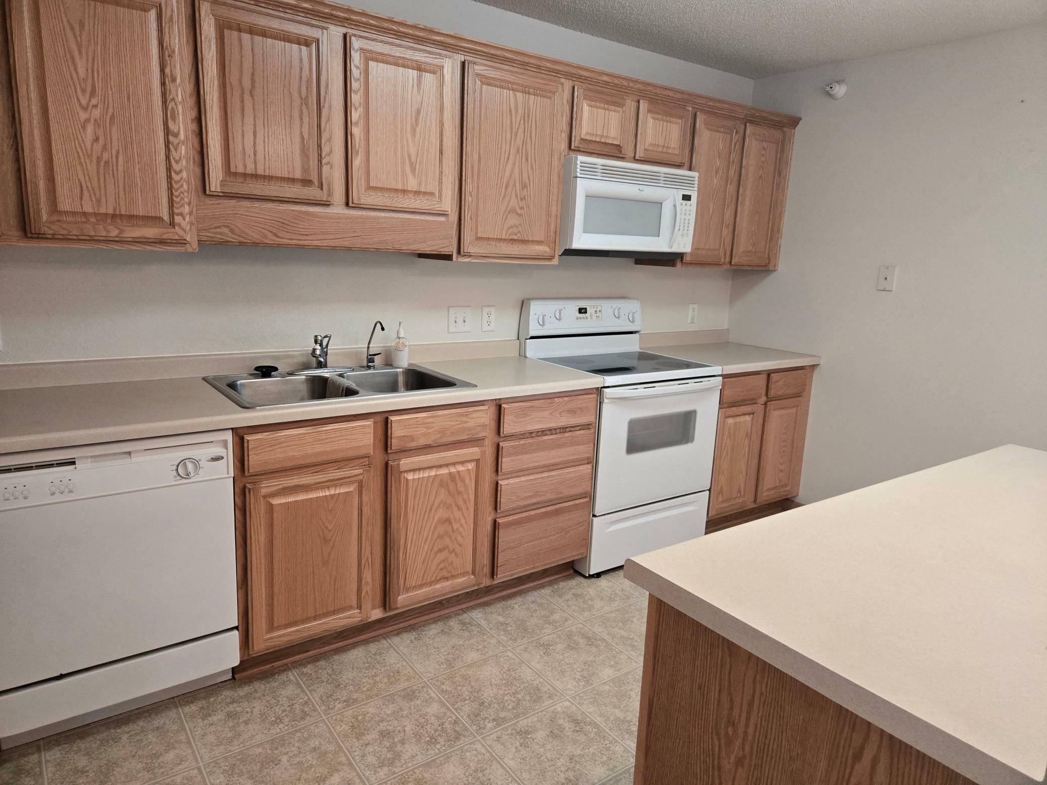 Property Photo: 15631 Linnet Street NW 3-208 MN 55304