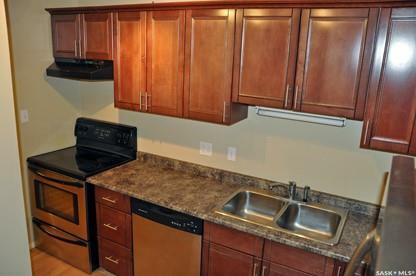 Property Photo:  225 Kingsmere Boulevard 301  SK S7J 4J6 
