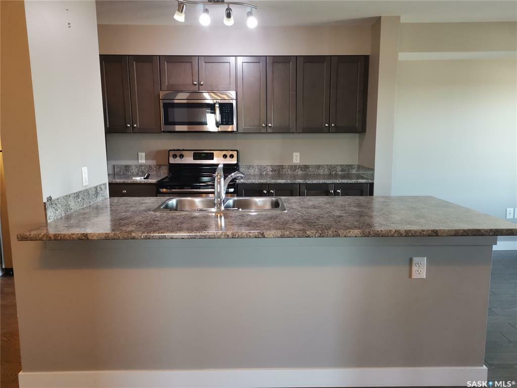Property Photo: 2141 Larter Road 209 SK S4A 2Y5