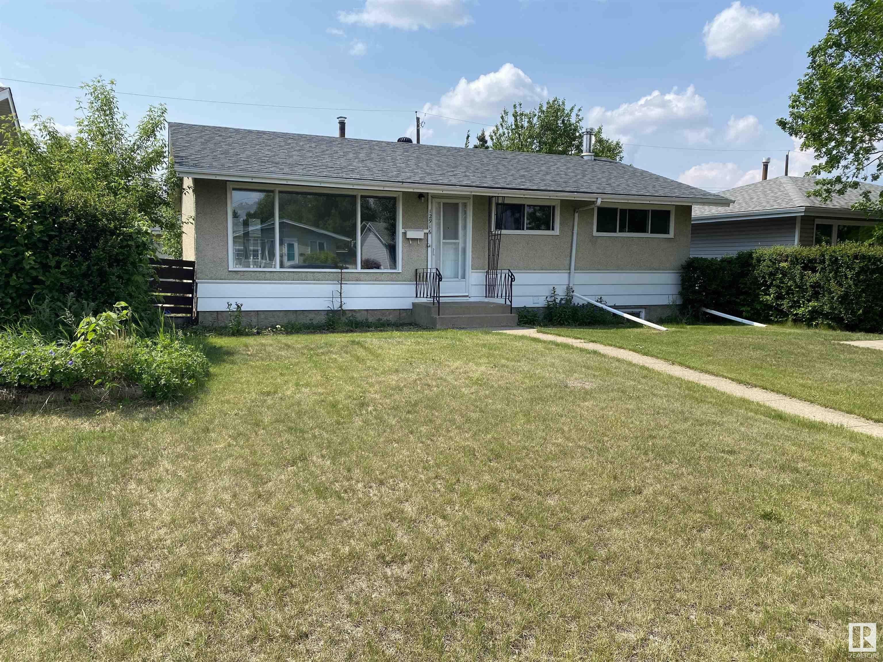 Property Photo: 12916 135 Street NW AB T5L 1Y2