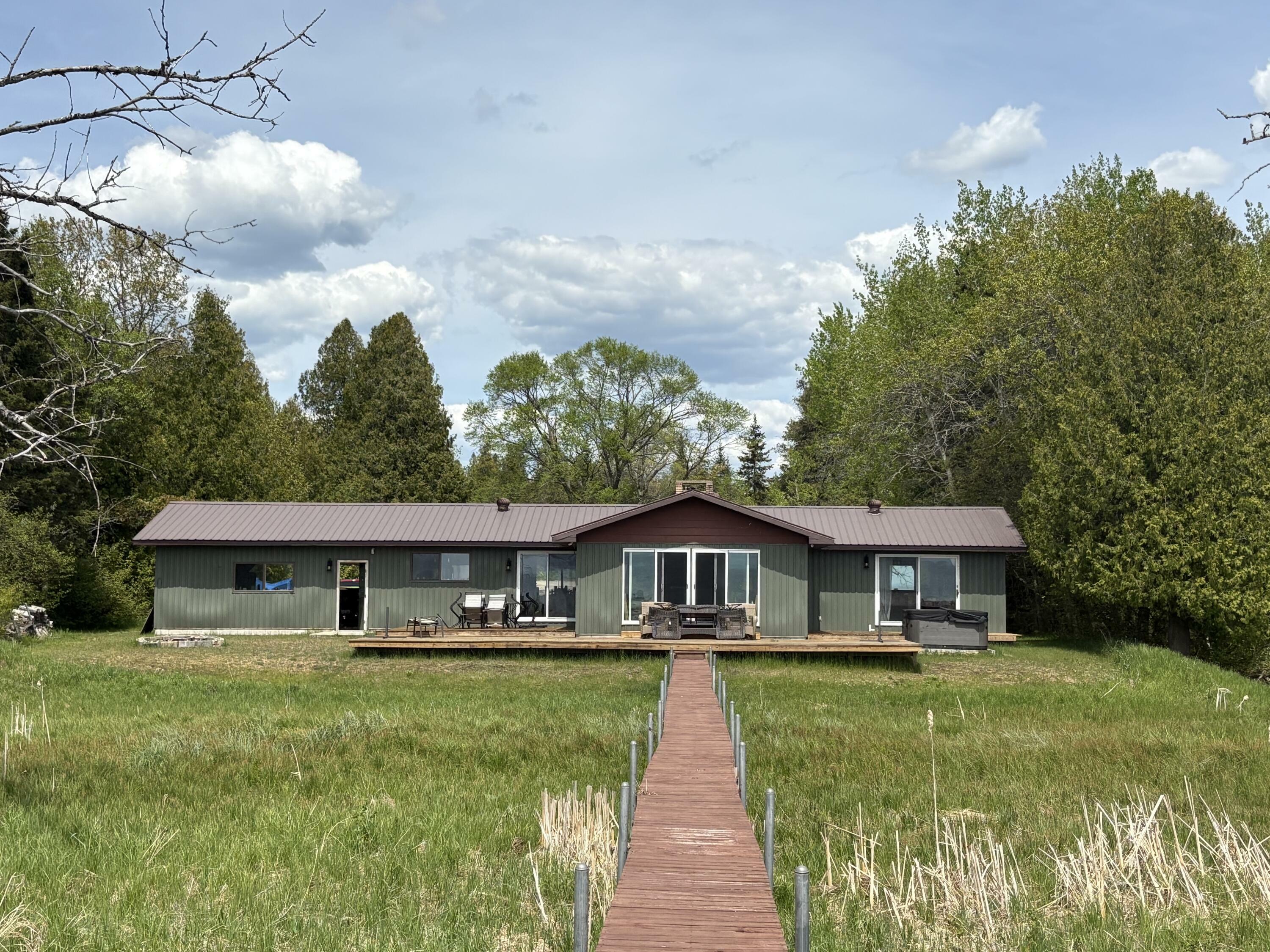 Property Photo: W11991 Middle Beach Rd MI 49762