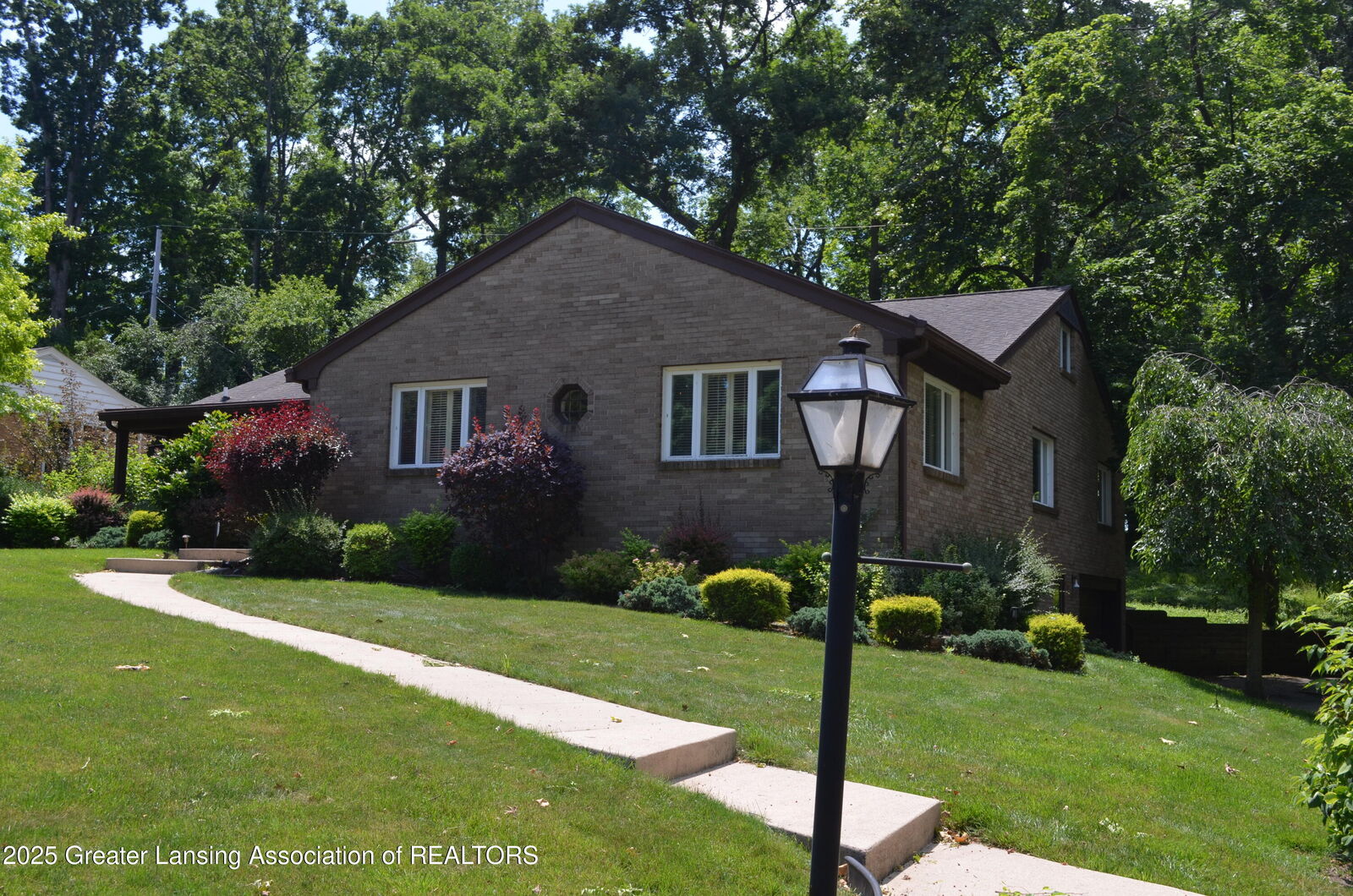 Property Photo: 408 Whitehills Drive MI 48823