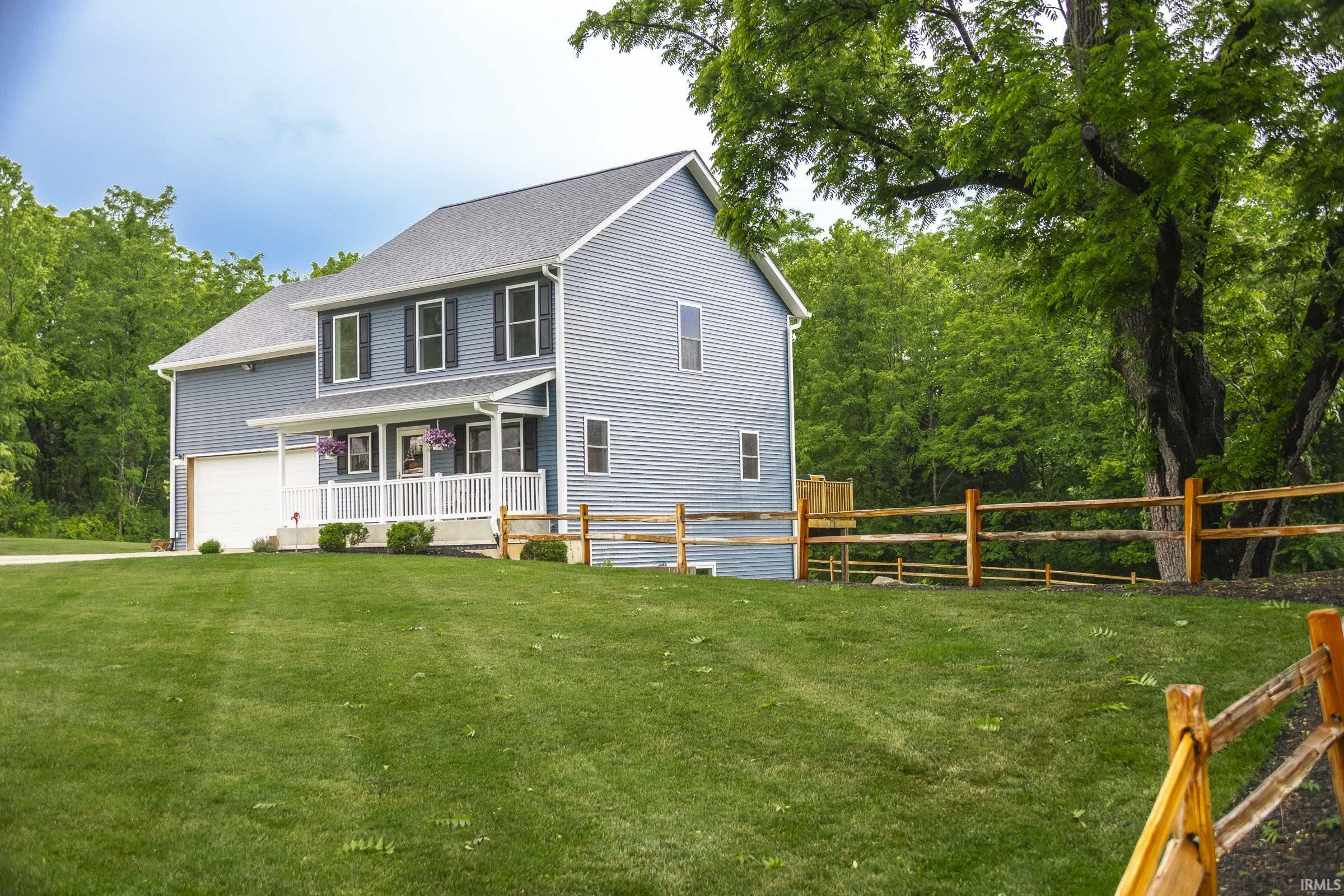 Property Photo: 1256 E Zinnia Drive IN 47401
