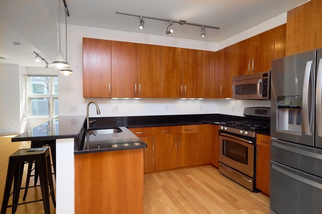 Property Photo:  24 Bay State Rd 7  MA 02138 