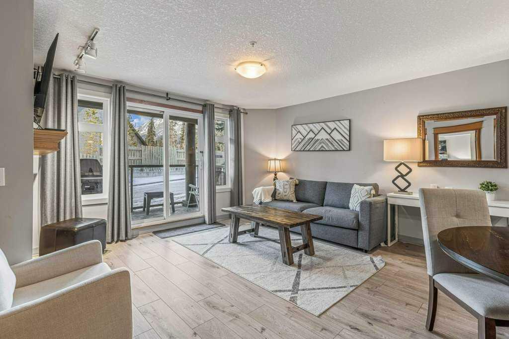 Property Photo: 160 Kananaskis Way 110 AB T1W 3E2